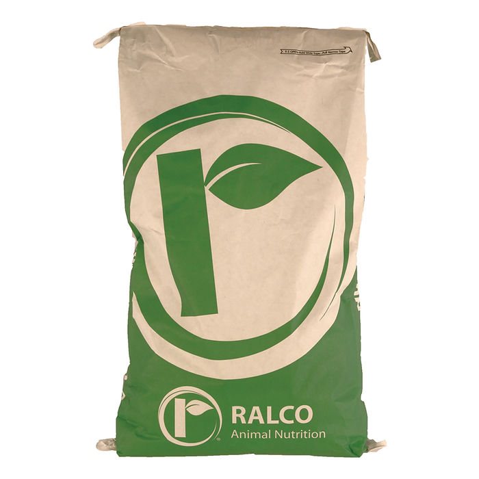 A large beige and green bag labeled "Easy Lax" with a stylized leaf logo and "RALCO Animal Nutrition" printed on the front. The bag appears full and is closed at the top.